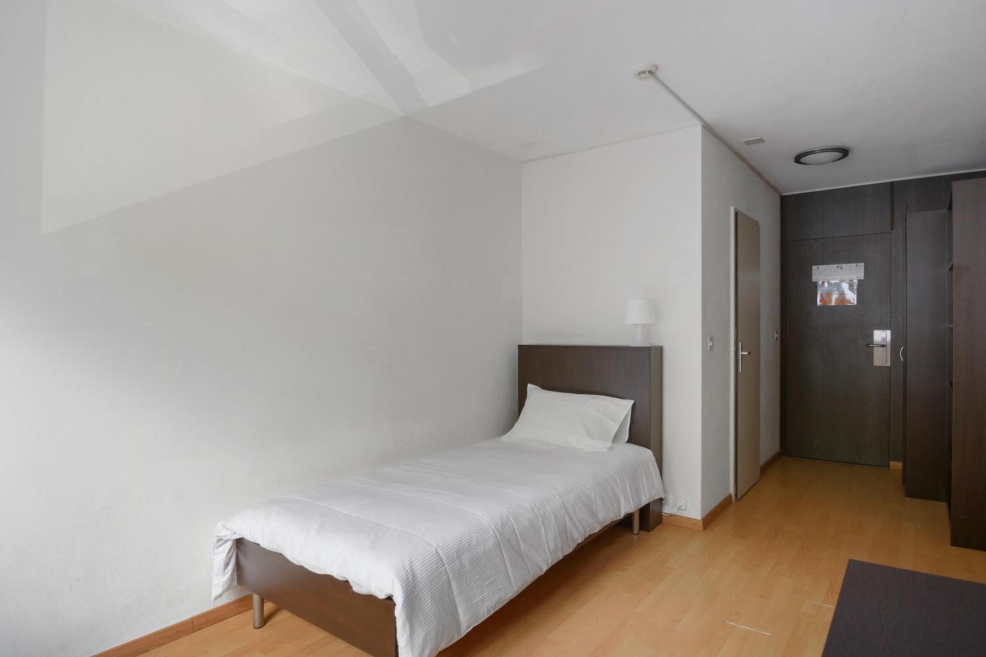 Neuchâtel City Hôtel Quarto foto
